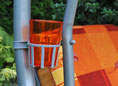 Porta bevande per dondolo argento bicchiere arancio