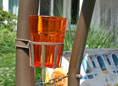 Porta bevande per dondolo mocca bicchiere arancio